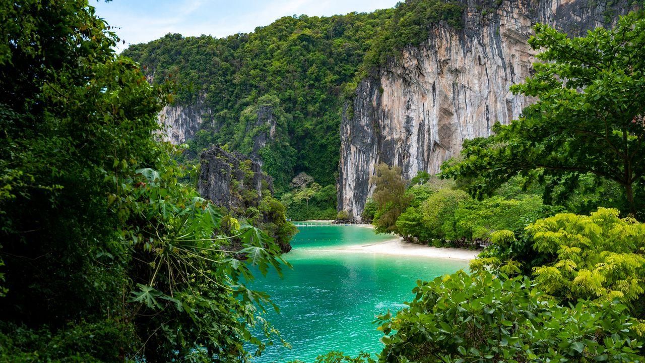 Limestone cliffs and turquoise lagoon in Thailand
